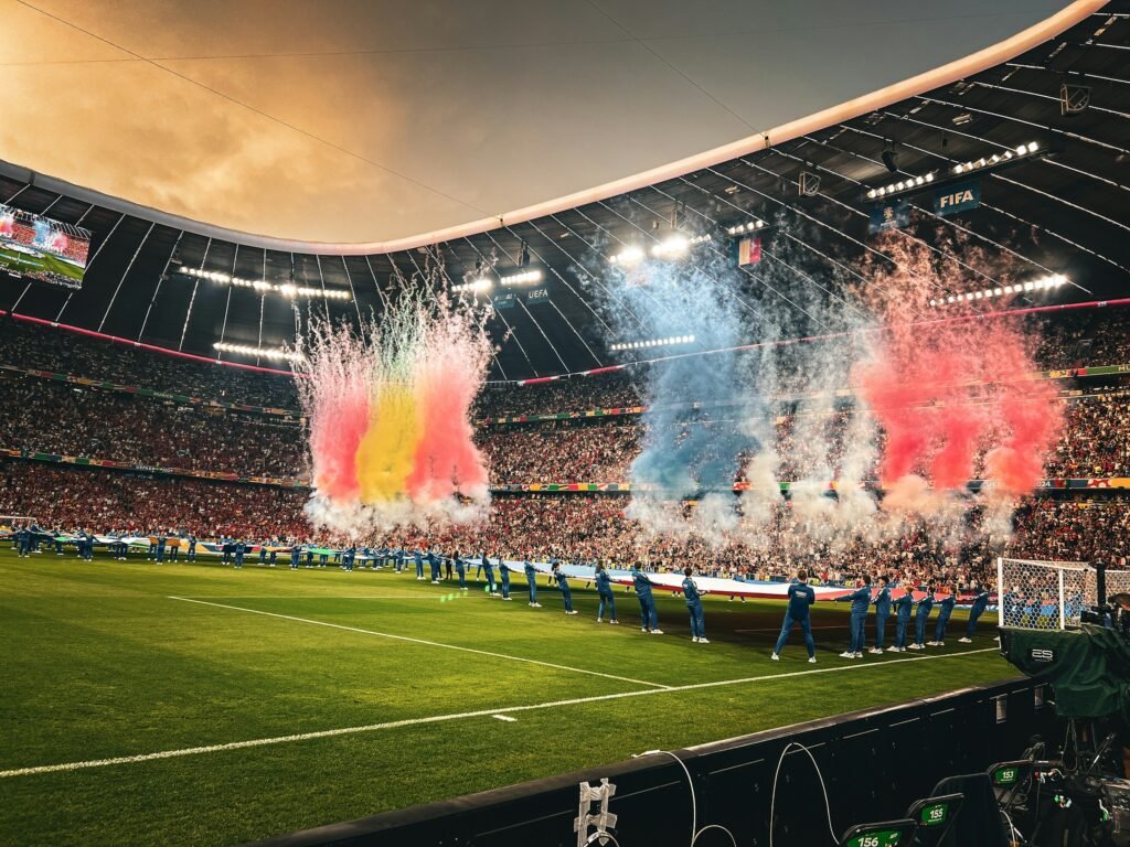Soccer fans watching the 2026 World Cup on big screens at an outdoor Orange County beer garden