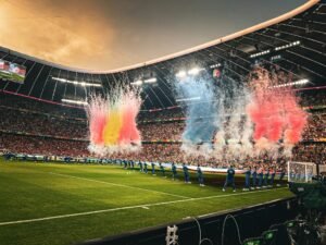 Soccer fans watching the 2026 World Cup on big screens at an outdoor Orange County beer garden